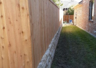 Board on Board w/ Single Trim & Brick Retaining Wall